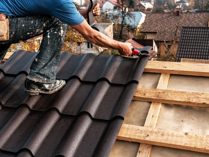 Roof repair preparation on a Florida home before hurricane season.